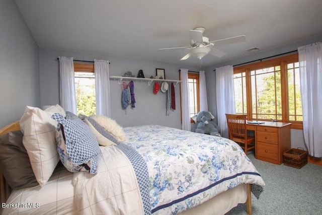 bedroom with light colored carpet and ceiling fan