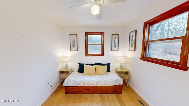 173 King Richard Dr, Becket, MA 01223 - bedroom with baseboards, light wood-type flooring, and a ceiling fan