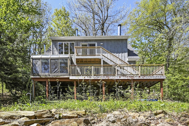173 King Richard Dr, Becket, MA 01223 - rear view of house with a deck, a sunroom, and stairway