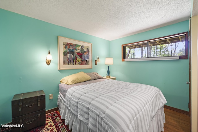 284 Brewer Branch Rd, New Marlborough, MA 01230 - bedroom featuring wood finished floors, a textured ceiling, and baseboards