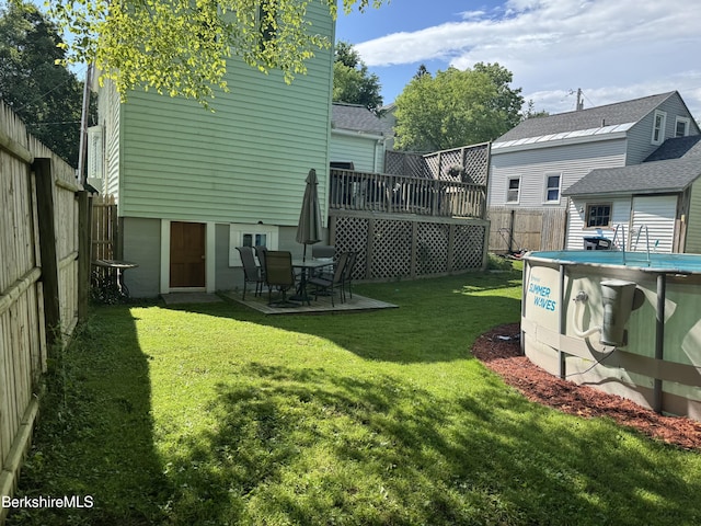 9 Dwight St, Pittsfield, MA 01201 - fenced backyard with a deck