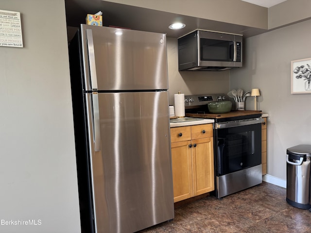 9 Dwight St, Pittsfield, MA 01201 - kitchen featuring stainless steel appliances, light countertops, and recessed lighting