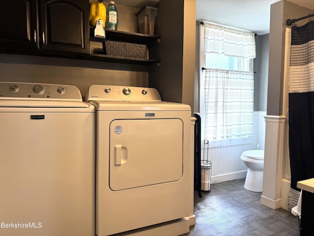 9 Dwight St, Pittsfield, MA 01201 - washroom with separate washer and dryer, wainscoting, and healthy amount of natural light