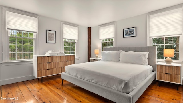 bedroom featuring dark hardwood / wood-style floors