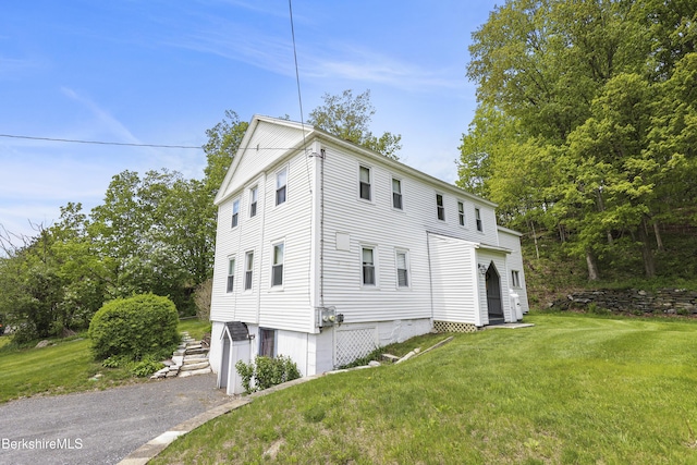 203-205 Main St, Hancock, MA 01237 - view of home's exterior with an attached garage, a lawn, and driveway