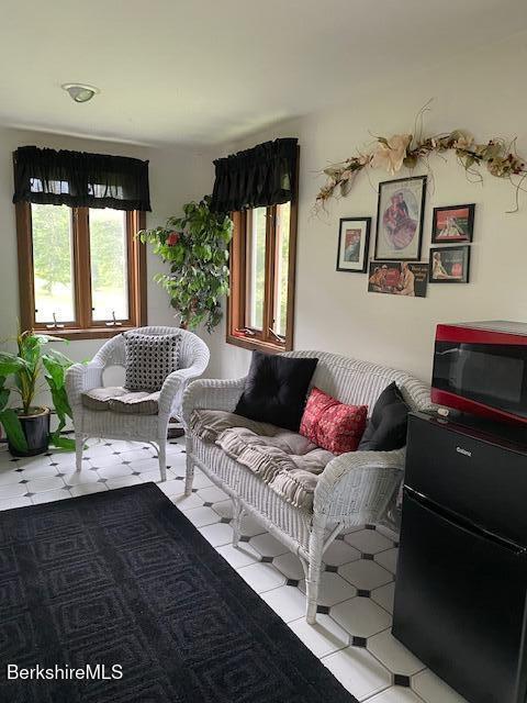 16 Woodlawn Ave, North Adams, MA 01247 - living room with tile patterned flooring