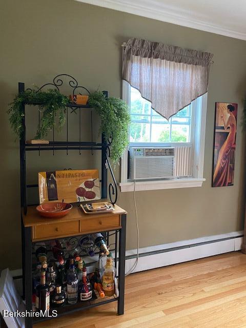 16 Woodlawn Ave, North Adams, MA 01247 - interior space with a baseboard radiator, ornamental molding, and wood finished floors
