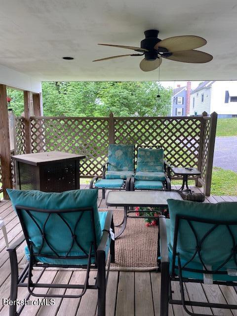 16 Woodlawn Ave, North Adams, MA 01247 - view of patio featuring ceiling fan, an outdoor living space, a wooden deck, and outdoor dining space