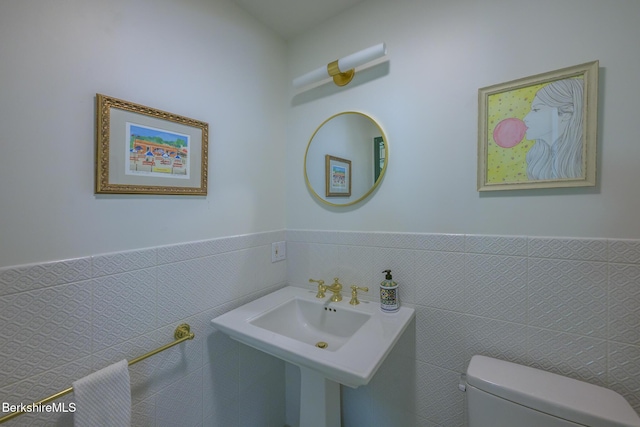 26 N Egremont Rd, Great Barrington, MA 01230 - half bath featuring wainscoting and tile walls