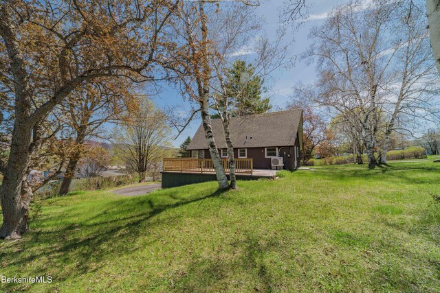 view of yard featuring a deck