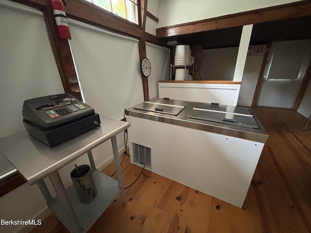 395 Laurel St, Lee, MA 01238 - kitchen featuring stainless steel counters and hardwood / wood-style flooring
