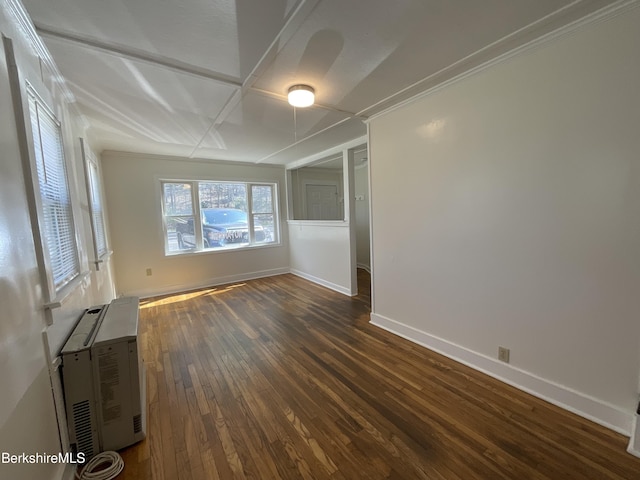 395 Laurel St, Lee, MA 01238 - spare room featuring dark wood-style flooring, baseboards, coffered ceiling, and ornamental molding