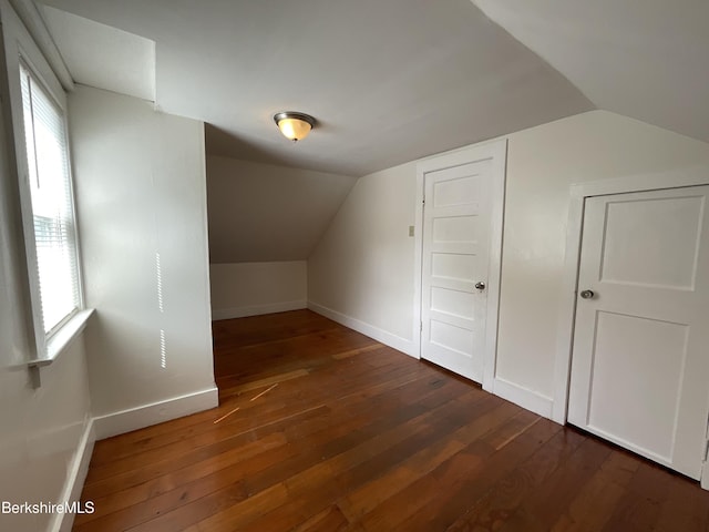 395 Laurel St, Lee, MA 01238 - additional living space with baseboards, wood-type flooring, and vaulted ceiling