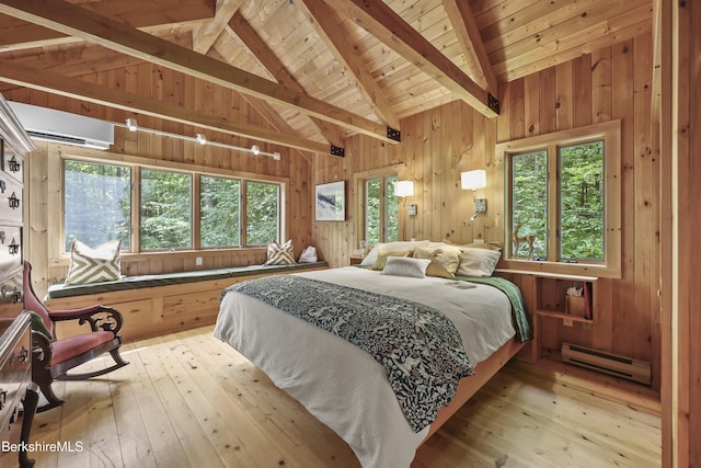 112 Silver St, Lanesborough, MA 01237 - bedroom featuring a baseboard heating unit, light wood-style flooring, a wall unit AC, wood walls, and wood ceiling