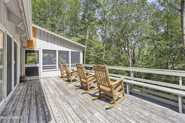 112 Silver St, Lanesborough, MA 01237 - deck with view of wooded area and a sunroom