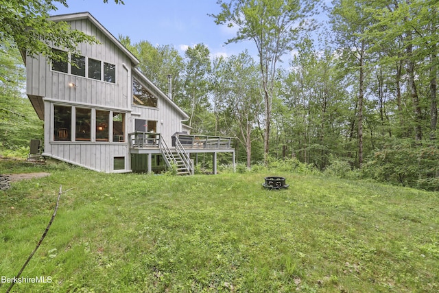 112 Silver St, Lanesborough, MA 01237 - view of green lawn featuring a fire pit, stairs, and a wooden deck