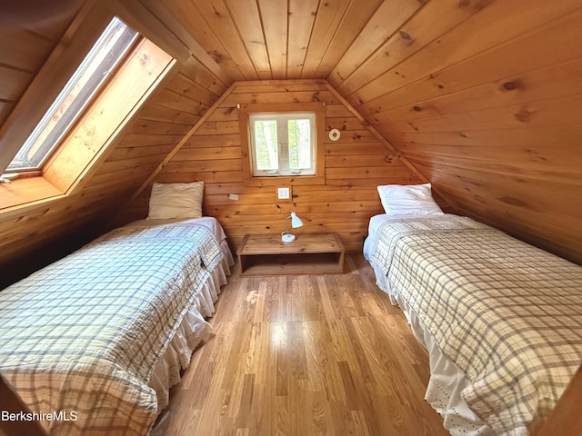 8 Brook Ln, Becket, MA 01223 - bedroom featuring wood finished floors, lofted ceiling, wooden ceiling, wood walls, and a skylight