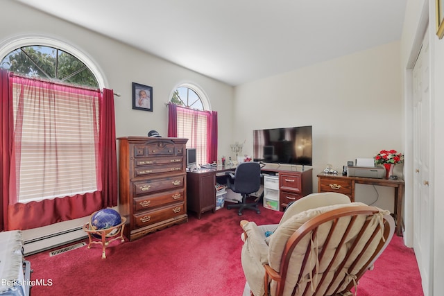 office space featuring baseboard heating, dark carpet, and visible vents