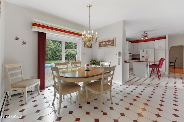 dining area with light floors and ceiling fan with notable chandelier