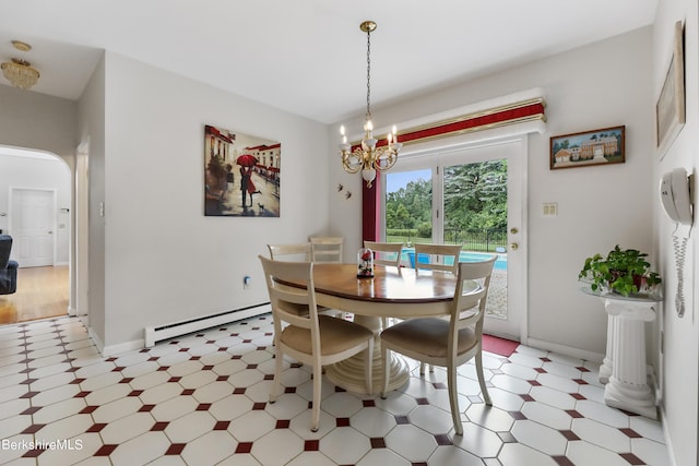 dining area with a baseboard heating unit, arched walkways, light floors, and an inviting chandelier