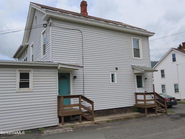16-18 Hoosac St, Adams, MA 01220 - back of house featuring a chimney