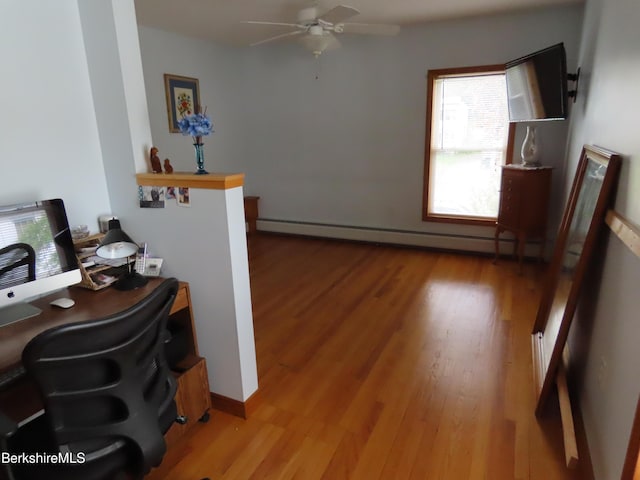 16-18 Hoosac St, Adams, MA 01220 - home office featuring baseboard heating, a ceiling fan, and wood finished floors