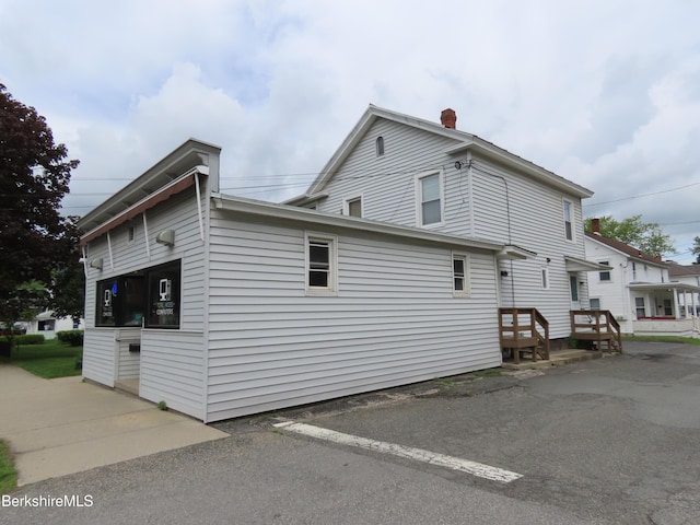 16-18 Hoosac St, Adams, MA 01220 - view of home's exterior featuring a chimney