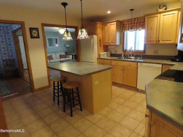 16-18 Hoosac St, Adams, MA 01220 - kitchen with a sink, white appliances, a center island, a breakfast bar, and light tile patterned floors