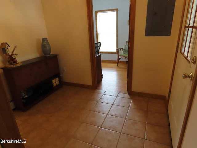 16-18 Hoosac St, Adams, MA 01220 - corridor with electric panel, light tile patterned floors, baseboards, and baseboard heating