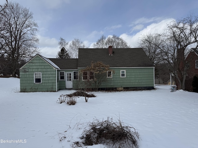 view of snow covered house