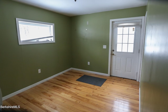 doorway to outside featuring light hardwood / wood-style floors