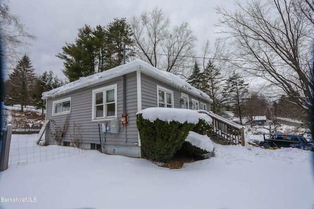 view of snow covered property