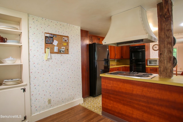 31 Oxbow Rd, Charlemont, MA 01339 - kitchen featuring black appliances, wallpapered walls, island exhaust hood, baseboards, and a peninsula