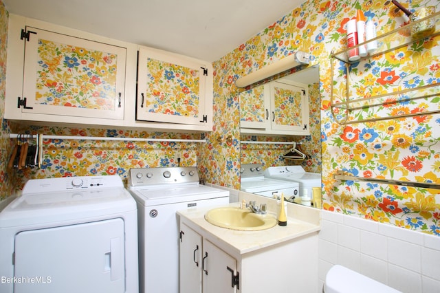 31 Oxbow Rd, Charlemont, MA 01339 - washroom with washing machine and dryer and wallpapered walls