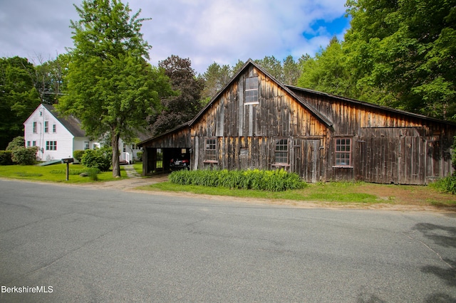 31 Oxbow Rd, Charlemont, MA 01339 - chalet / cabin with a barn, an outdoor structure, and a detached garage