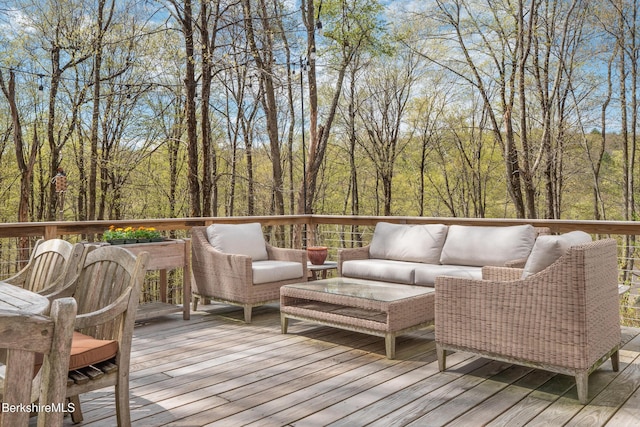 deck featuring an outdoor living space