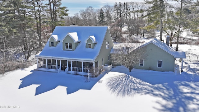 view of front of property with a sunroom