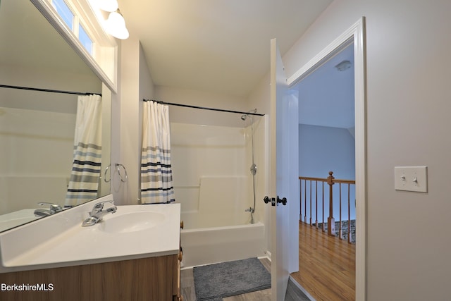 bathroom with vanity and shower / bathtub combination with curtain