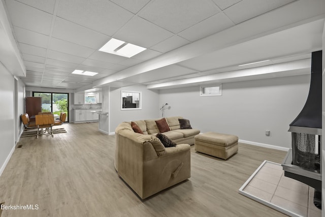 73 Narragansett Ave, Lanesborough, MA 01237 - living area featuring light wood finished floors and a drop ceiling