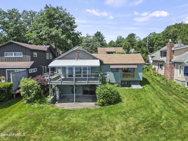 73 Narragansett Ave, Lanesborough, MA 01237 - back of property with a patio area, a lawn, and a wooden deck