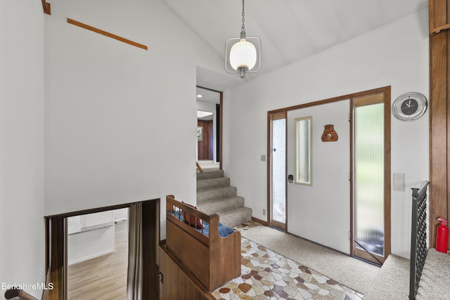 73 Narragansett Ave, Lanesborough, MA 01237 - entryway featuring lofted ceiling and stairway