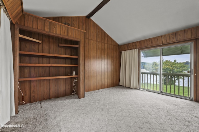 73 Narragansett Ave, Lanesborough, MA 01237 - unfurnished living room with vaulted ceiling, carpet flooring, and wooden walls