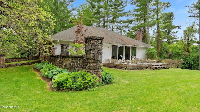 771 W Rd, Sheffield, MA 01257 - view of front facade with a chimney, a wooden deck, and a front yard