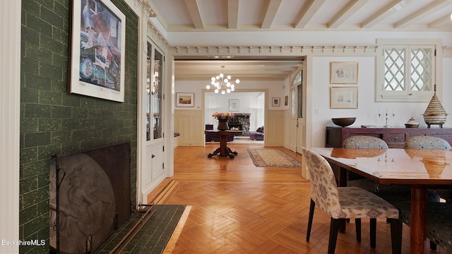 771 W Rd, Sheffield, MA 01257 - dining area with beamed ceiling, a chandelier, and a wainscoted wall