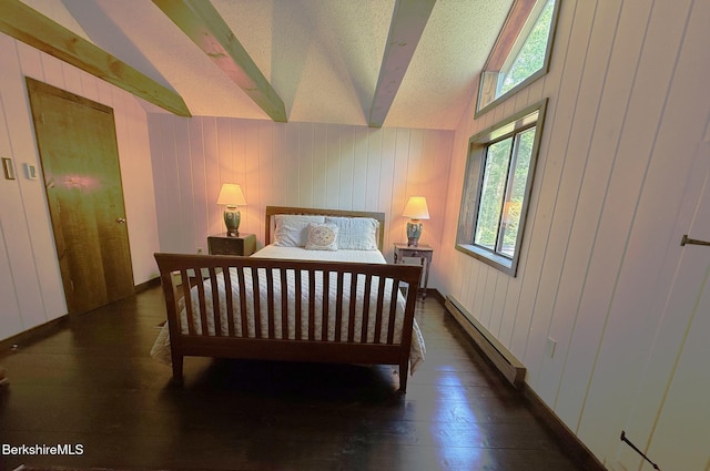 841 Moberg Rd, Becket, MA 01223 - bedroom with a baseboard heating unit, hardwood / wood-style floors, wooden walls, and a textured ceiling