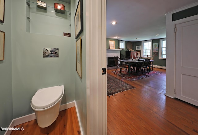 1 Train Hill Rd, Stockbridge, MA 01262 - bathroom featuring hardwood / wood-style flooring, toilet, and a baseboard radiator