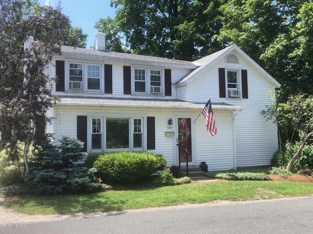 view of front of home featuring cooling unit