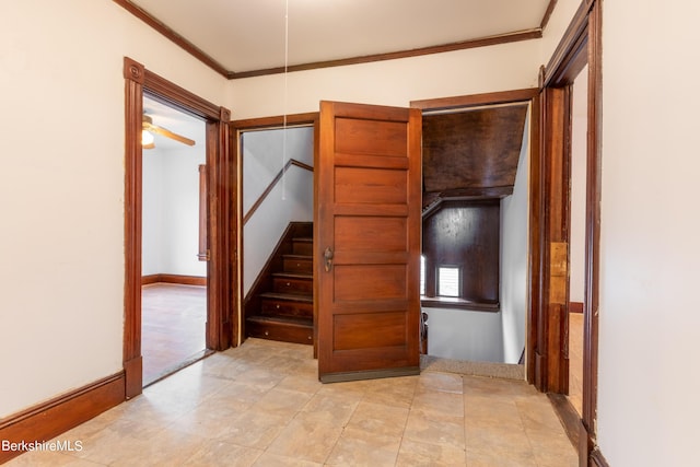 corridor featuring crown molding