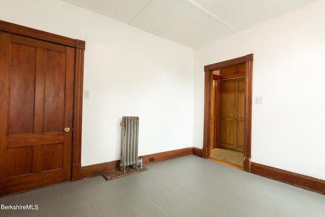 spare room with light hardwood / wood-style floors