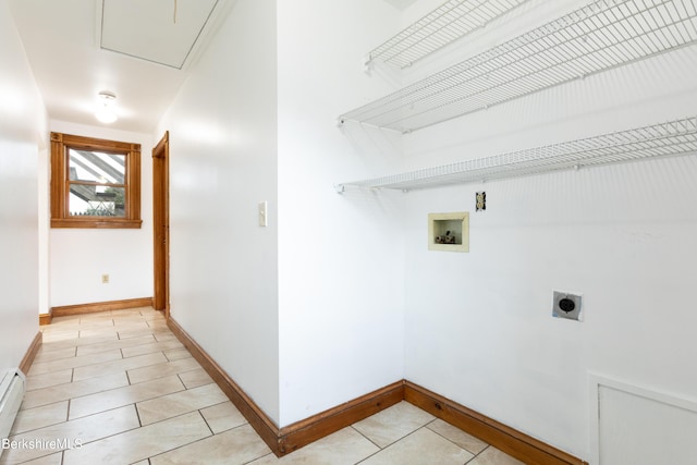 clothes washing area featuring electric dryer hookup, light tile patterned flooring, washer hookup, and a baseboard heating unit